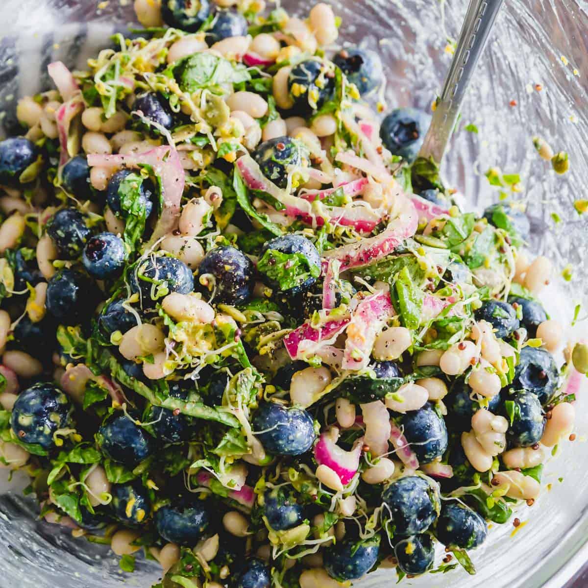 Enjoy this white bean and blueberry salad as a refreshing plant based meal or side dish to any protein.