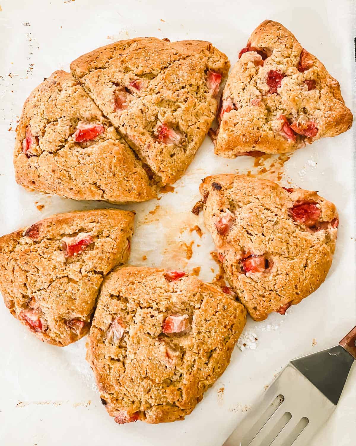 Tender and flaky strawberry lemon scones are brightly flavored and perfect for spring. Vegan, gluten-free, grain-free.