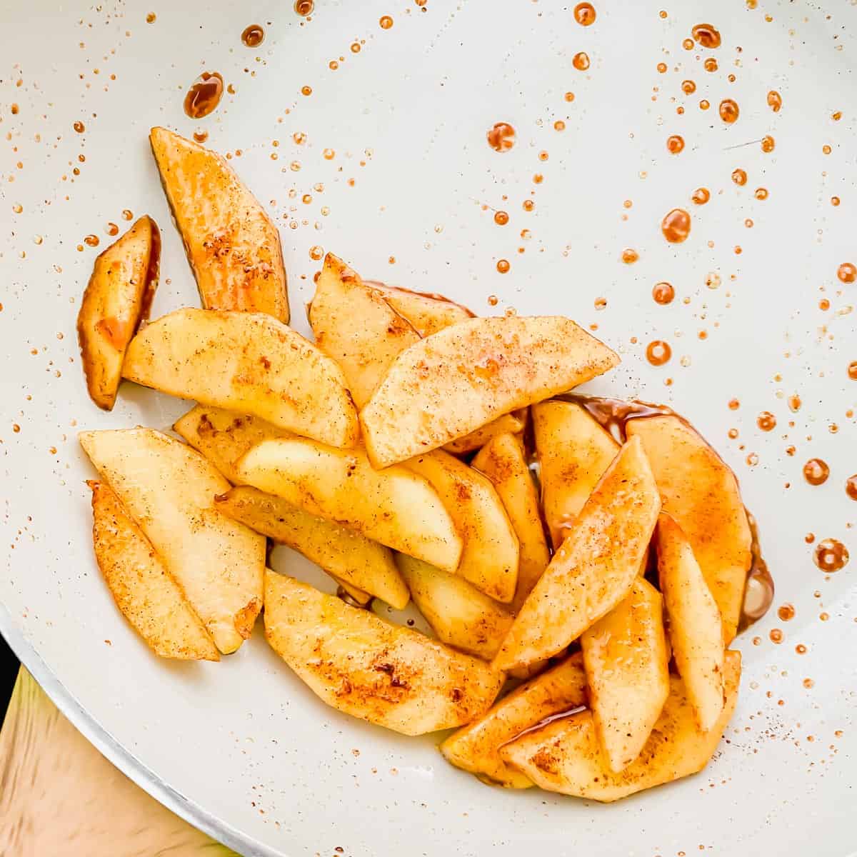 Sautéed maple syrup cinnamon apple slices to top the apple cinnamon oatmeal.