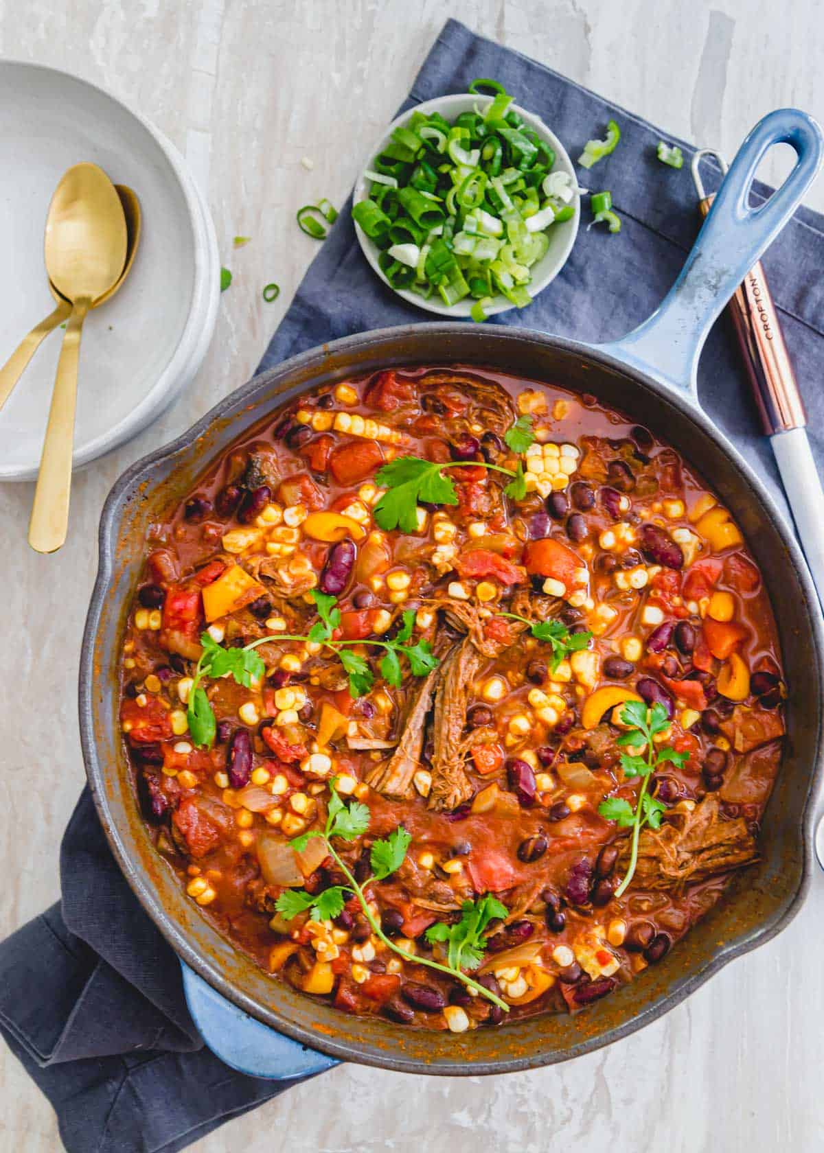 Hearty brisket chili made with kidney beans, black beans, peppers and fresh corn.