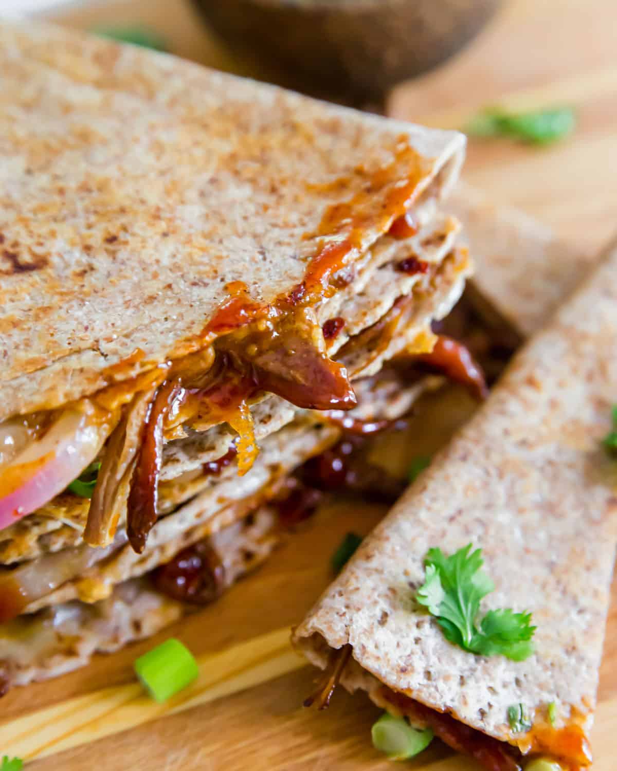 Use up leftover brisket in this simple brisket quesadilla recipe with BBQ sauce, red onions and cheddar cheese.