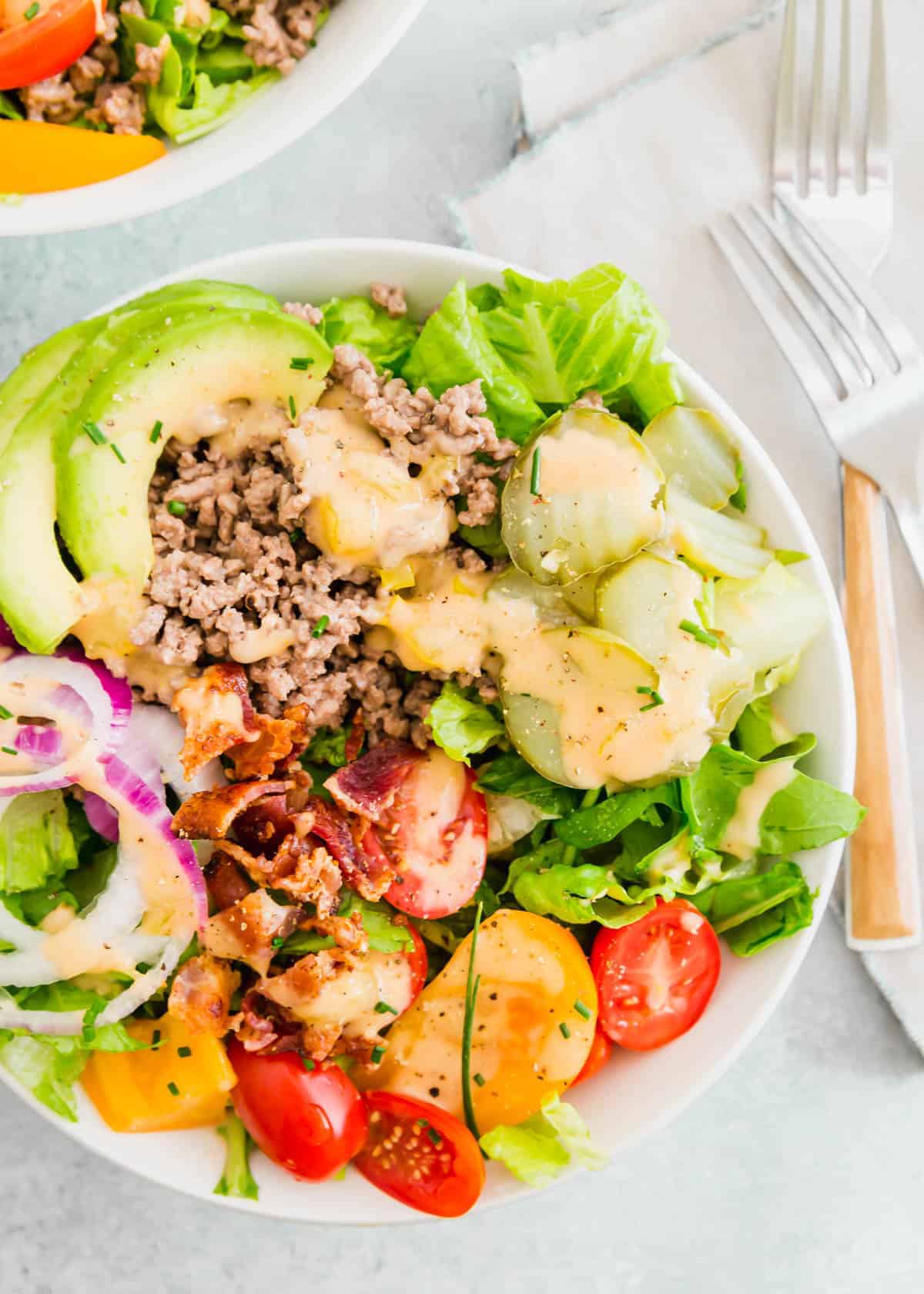 This burger in a bowl includes a homemade special burger sauce. It's got all the toppings and flavors of your favorite burger with a healthier spin!