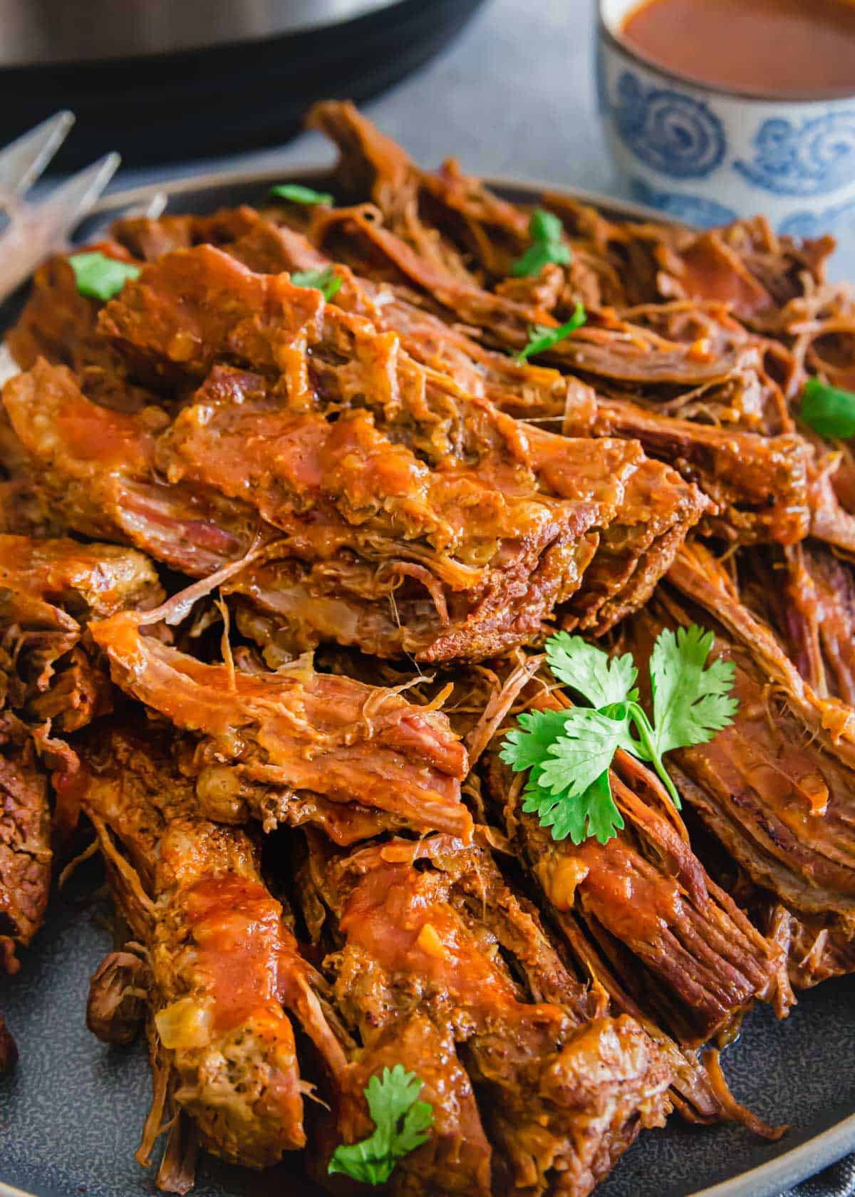 Tender, juicy pressure cooker BBQ beef brisket.