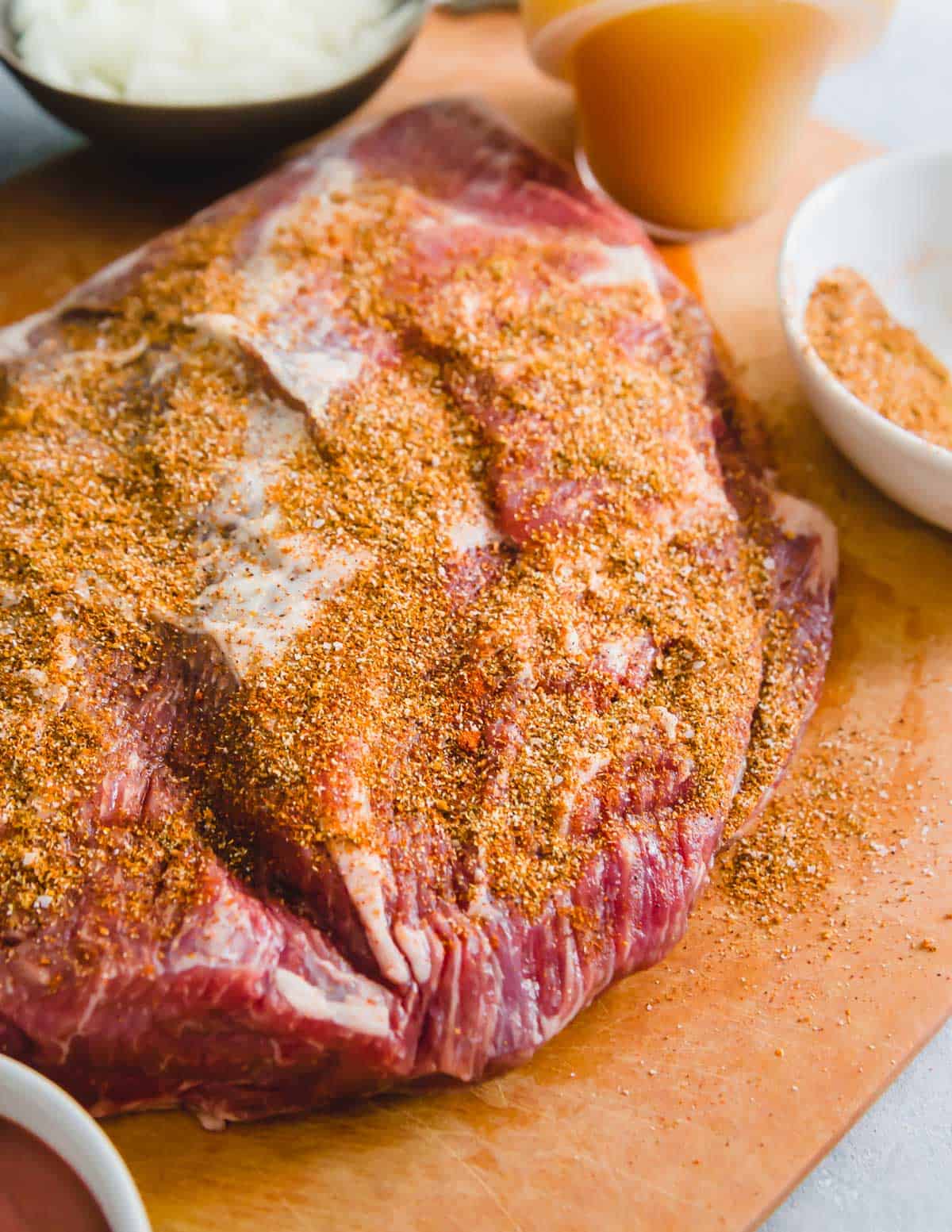 Beef brisket seasoned with a dry rub of spices before cooking in pressure cooker.