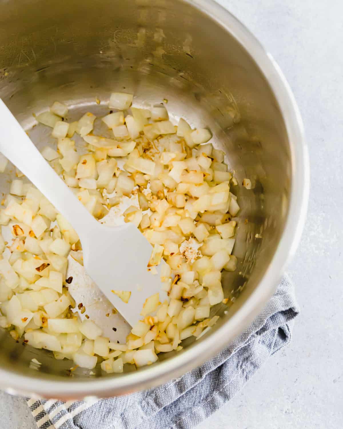 Sauté onions and garlic in Instant Pot before adding brisket.