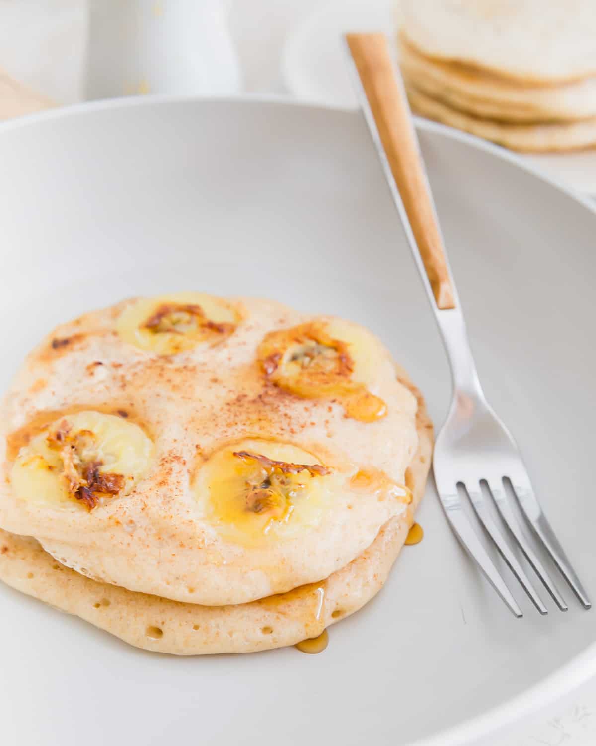 Leftover sourdough starter, also known as "discard" is the sole ingredient in these banana cinnamon sourdough pancakes.