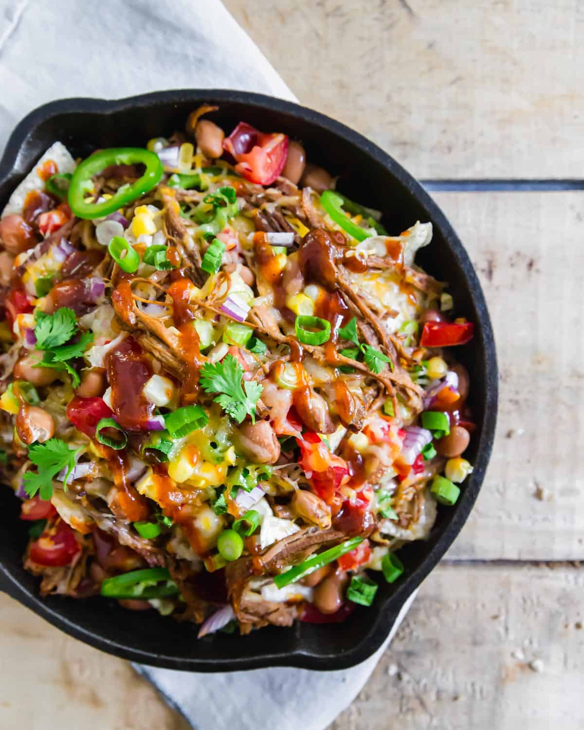 A simple recipe for BBQ beef brisket nachos you can enjoy as an appetizer, main dish or, addition to your game day spread.