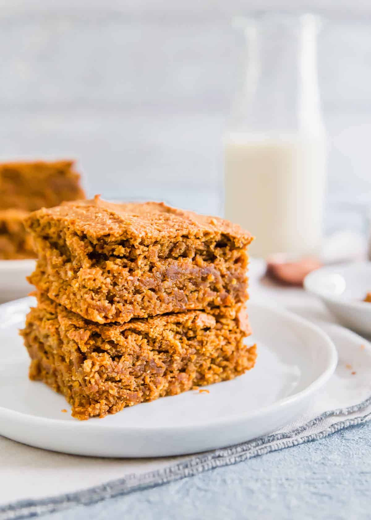 Moist, cake-like pumpkin bars that are gluten-free and vegan! Packed with fall spices to make a delicious afternoon snack or dessert.