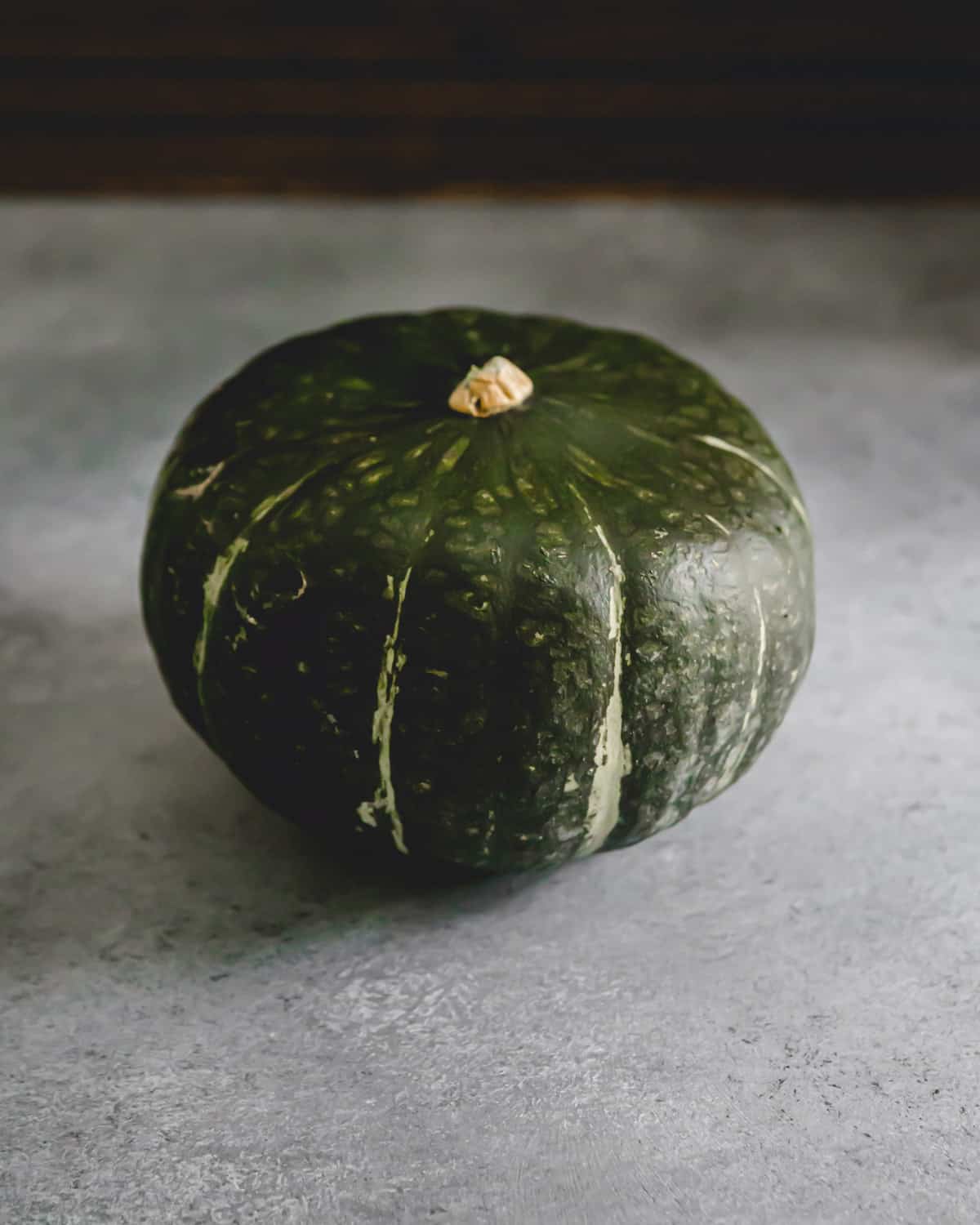 Whole buttercup squash before preparing and cooking.