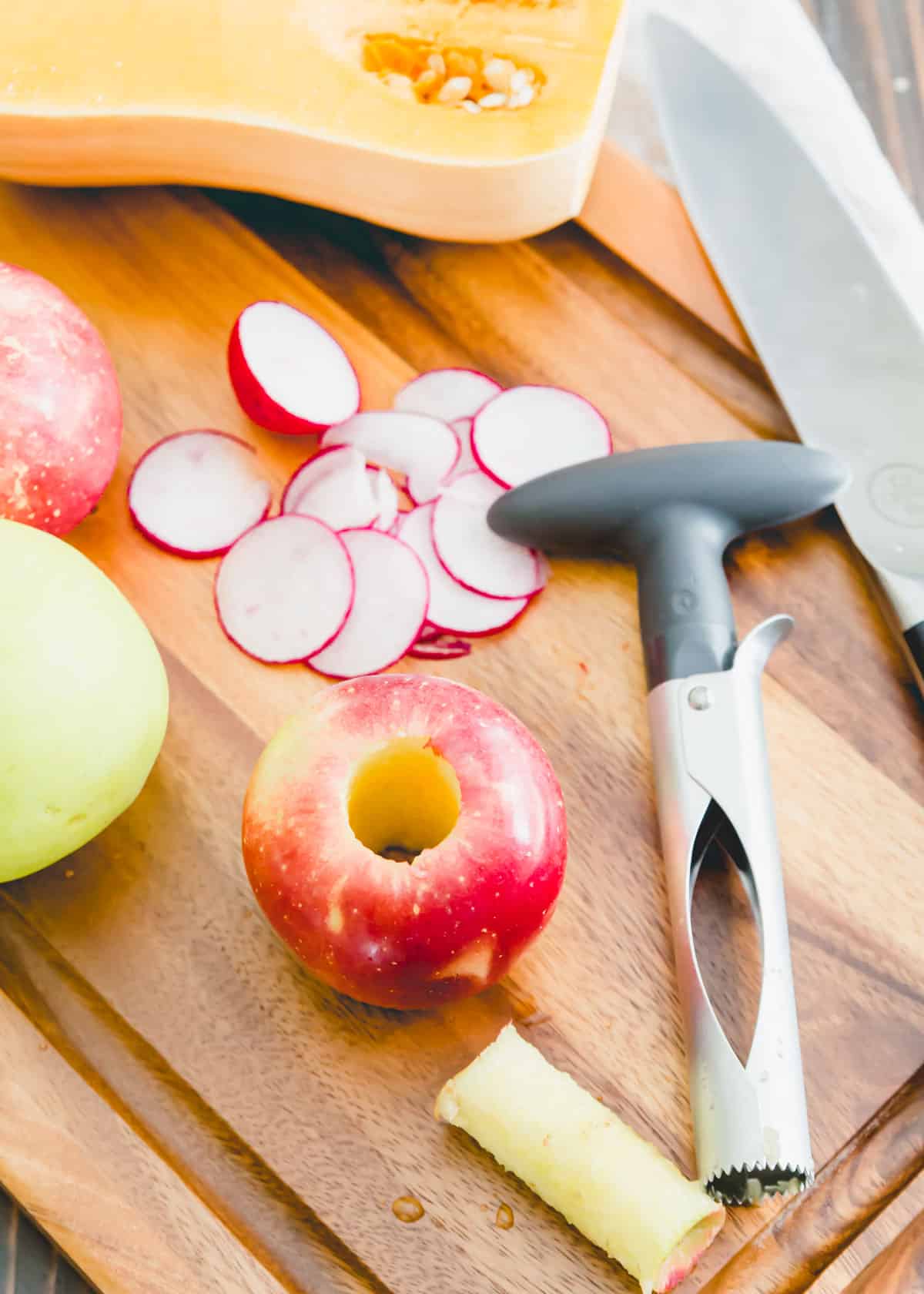 prepping apples and radishes for fall hummus pizza