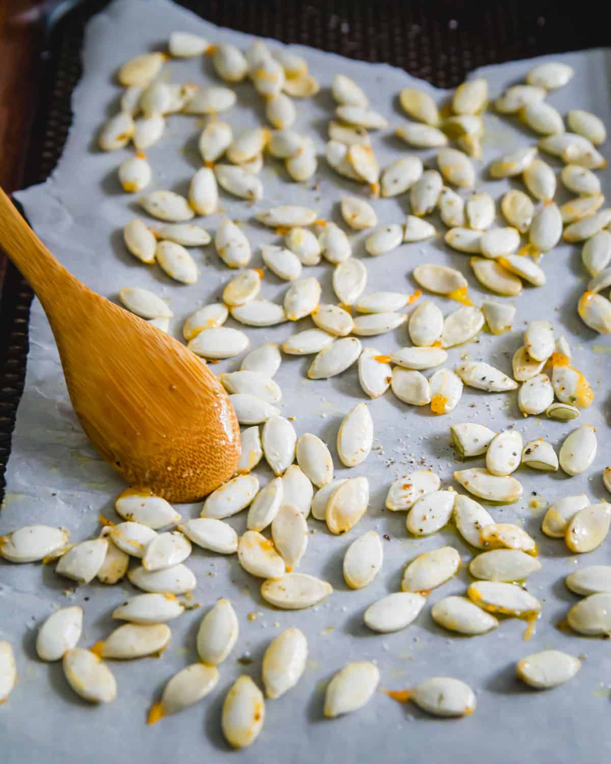 Squash seeds cleaned, seasoned and ready to be roasted in an oven