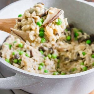 Risotto on a wooden spooon.