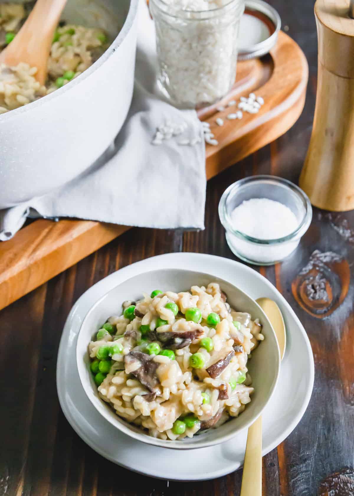 A simple, one-pot recipe for dairy-free, creamy vegan mushroom risotto with frozen peas