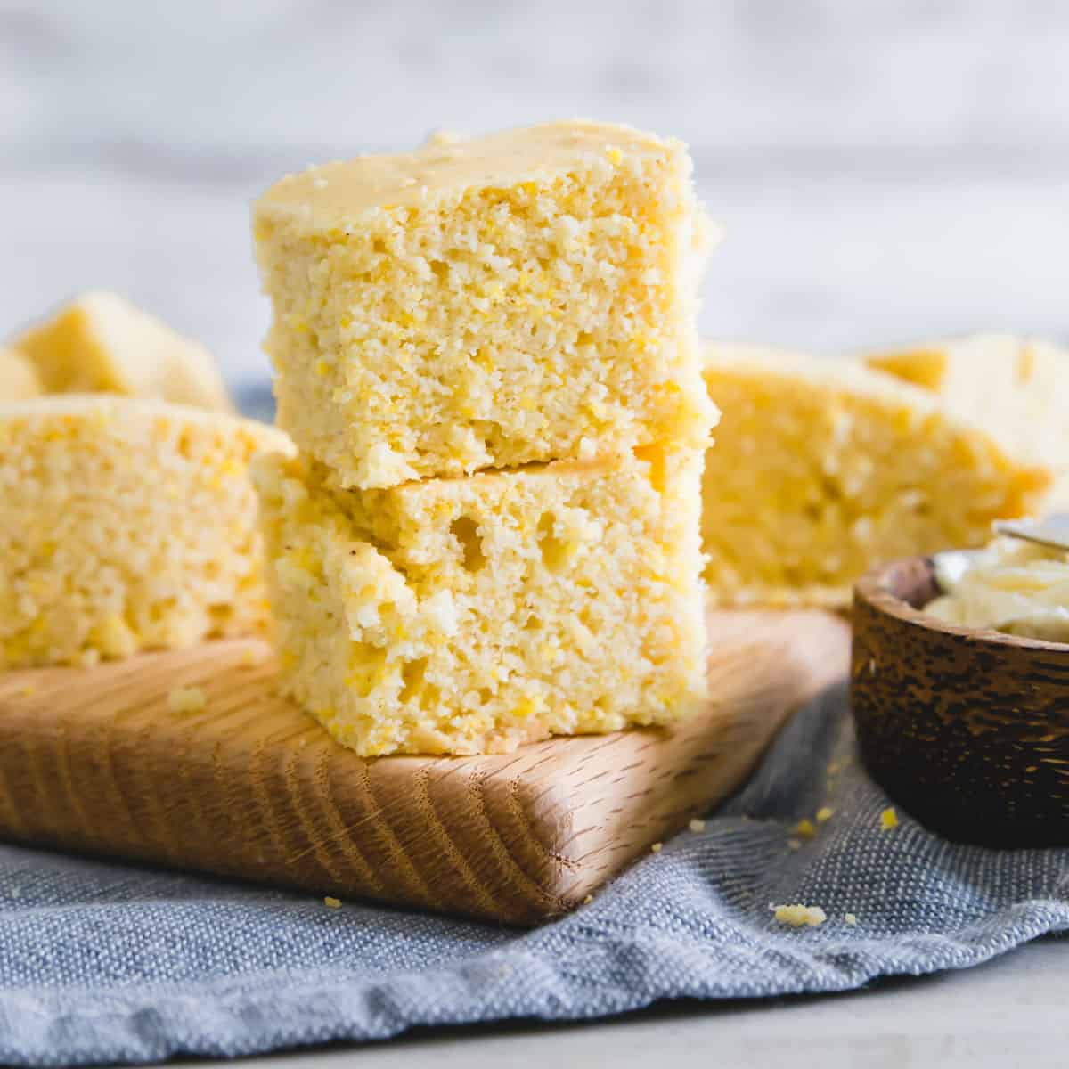 This easy vegan cornbread recipe is also gluten-free! It bakes up moist with the perfect textured cornbread bite and just a hint of sweetness so you can enjoy it with a bowl of chili or soup just as much as with a pat of butter by itself!