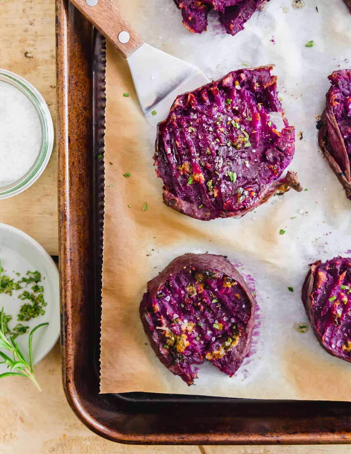 Stokes purple sweet potatoes are a stunning bright purple fleshed potato perfect for roasting with butter and herbs.