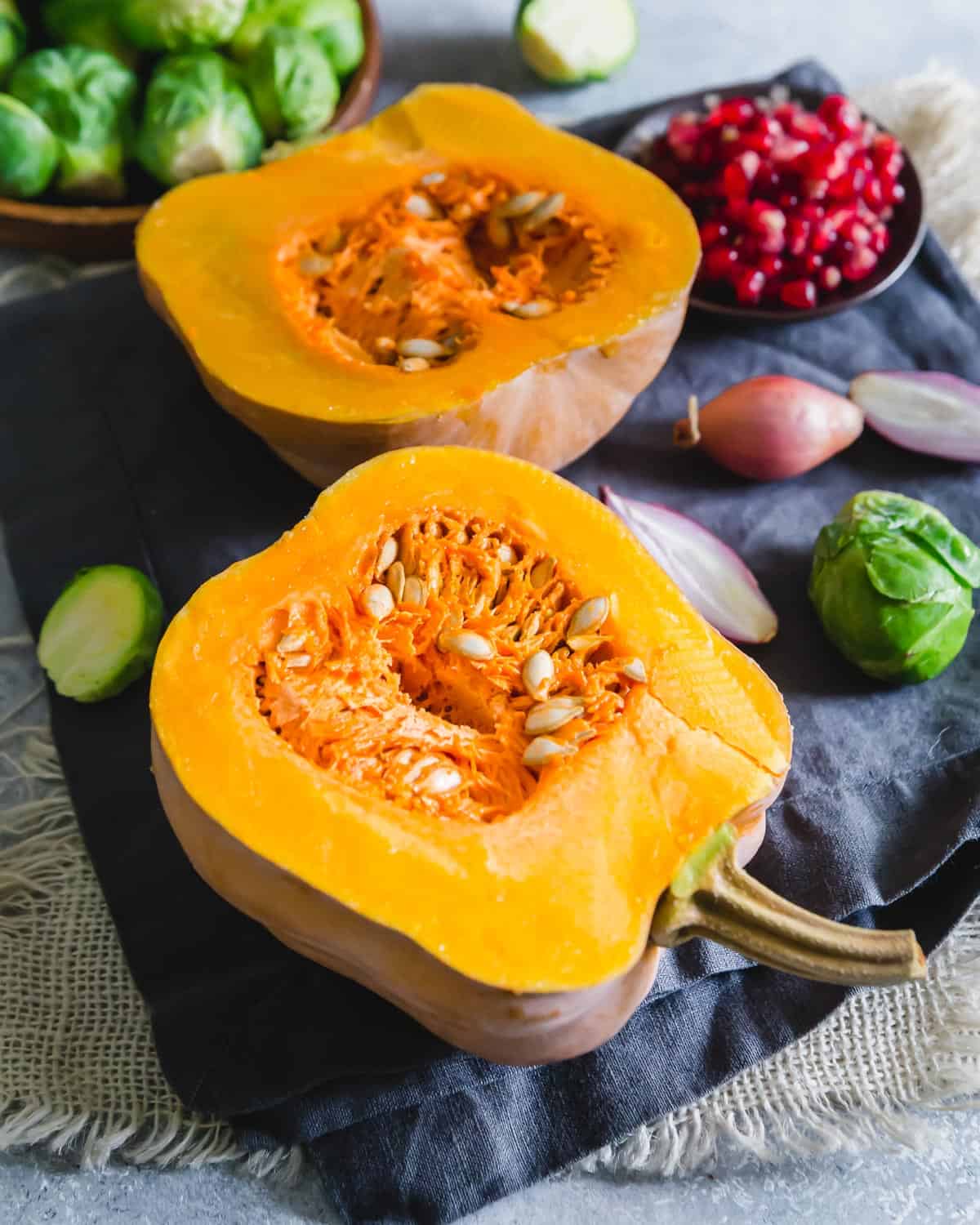 halved koginut squash with seeds