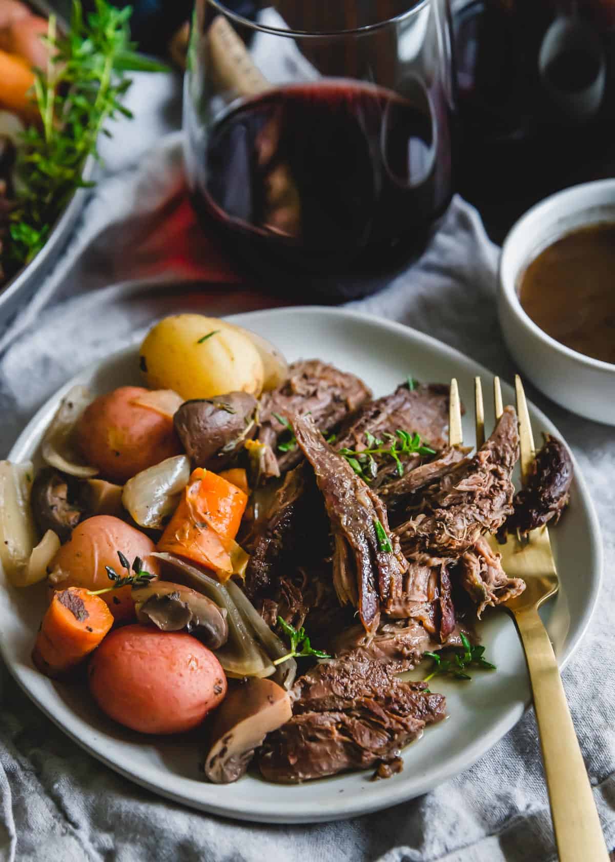 This easy Instant Pot venison roast is cooked along with baby potatoes, mushrooms, carrots and onions for a comforting winter meal all made in one pot.