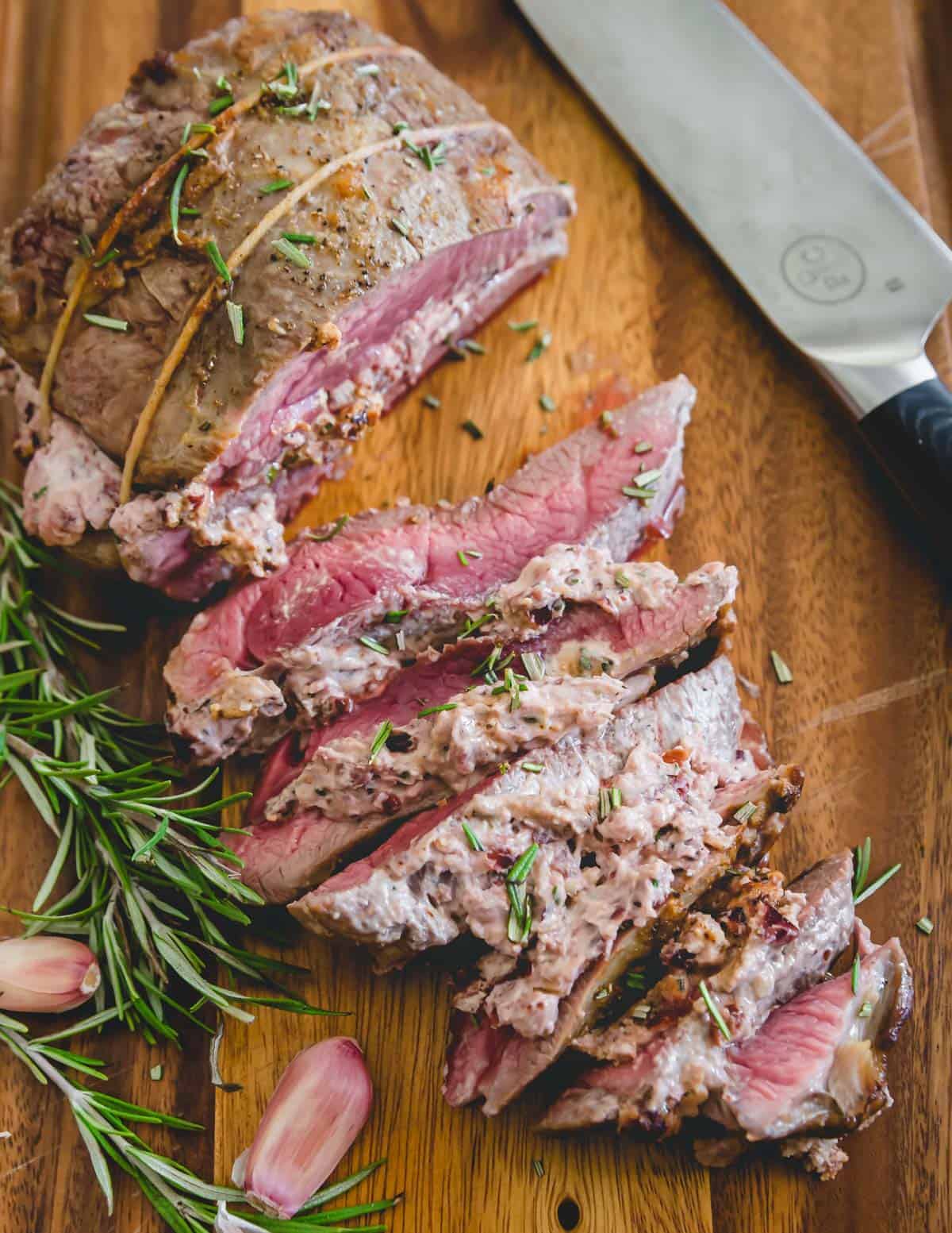 Try this easy butterflied leg of lamb recipe with cranberry goat cheese stuffing for a simple yet elegant holiday meal.