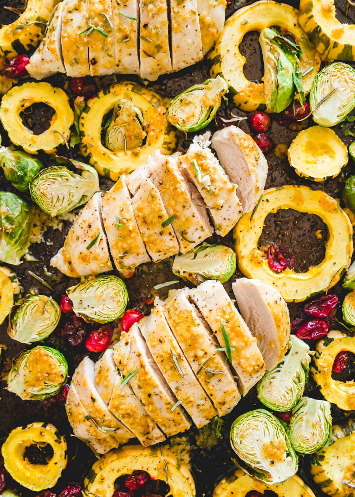 Maple mustard chicken with rosemary and fall vegetables comes together in just 20 minutes on one pan.