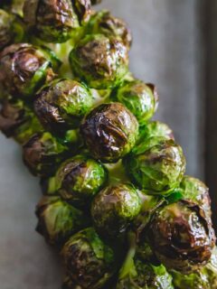 maple roasted brussels sprouts on the stalk