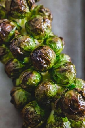 maple roasted brussels sprouts on the stalk