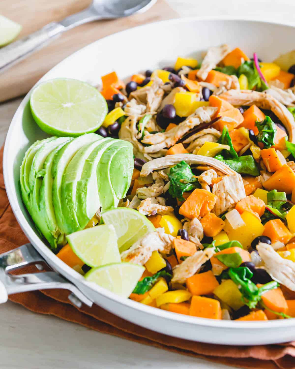 This turkey sweet potato skillet is a healthy way to repurpose leftover turkey (or chicken) with sweet potatoes, black beans, peppers, greens and onions. 