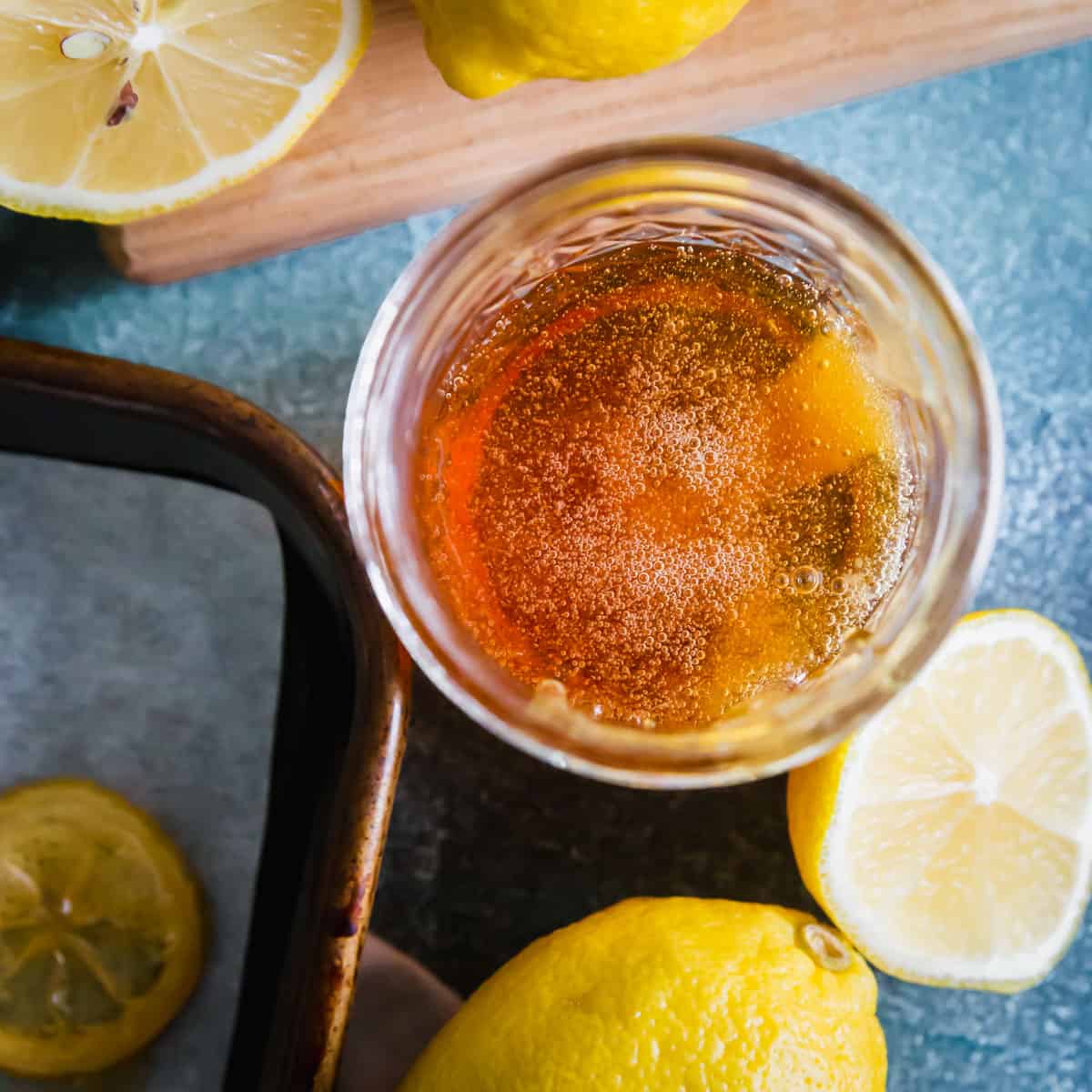 Leftover lemon flavored simple syrup from making candied lemon slices can be jarred and saved for future use!