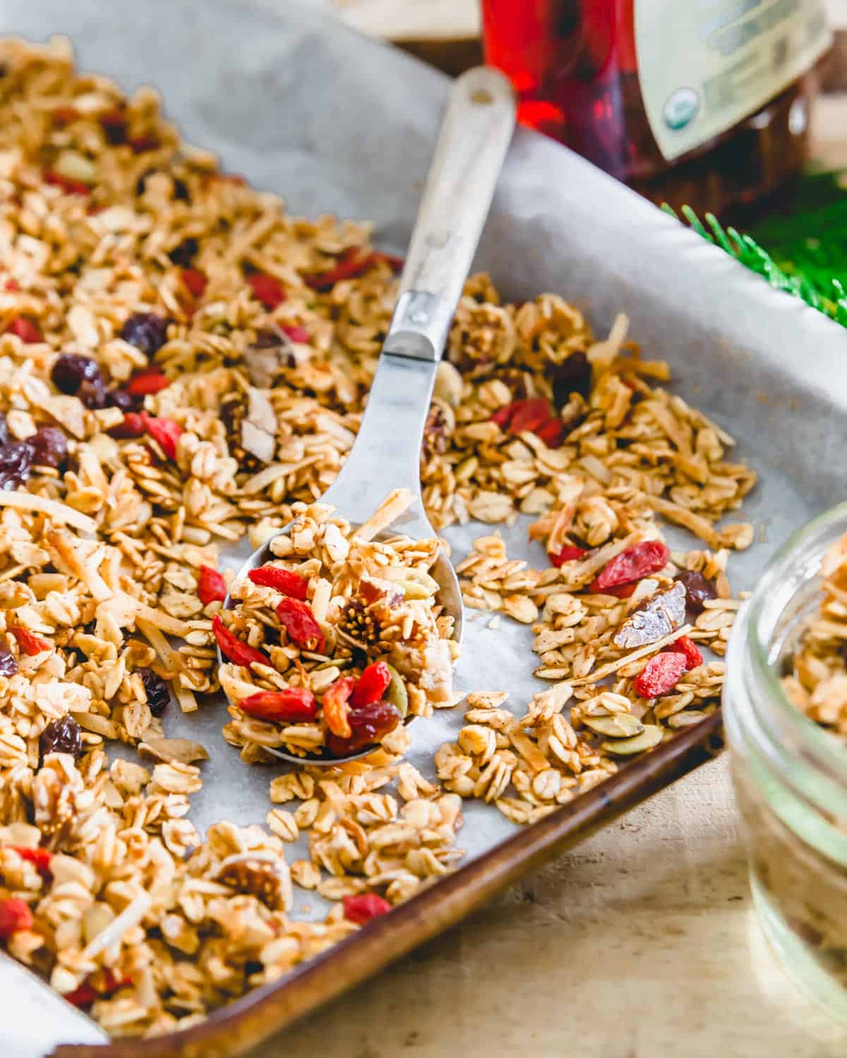 Gluten free oat based granola made with pepitas, sunflower seeds, buckwheat groats, goji berries, raisins and figs uses absolutely no nuts in the recipe so it's perfect for all diets!