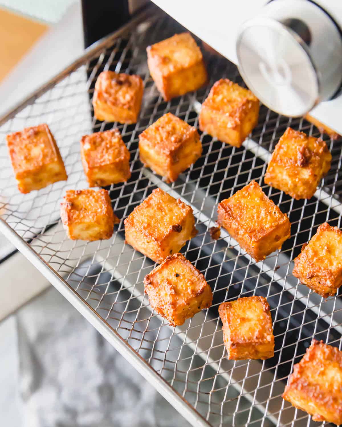 Extra crispy air fried tofu takes just 15 minutes to make.