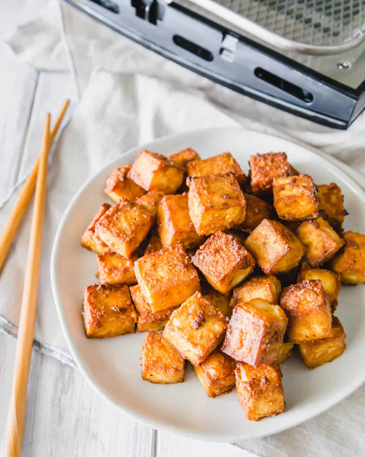 Learn how to make tofu in an air fryer with this quick and easy recipe.