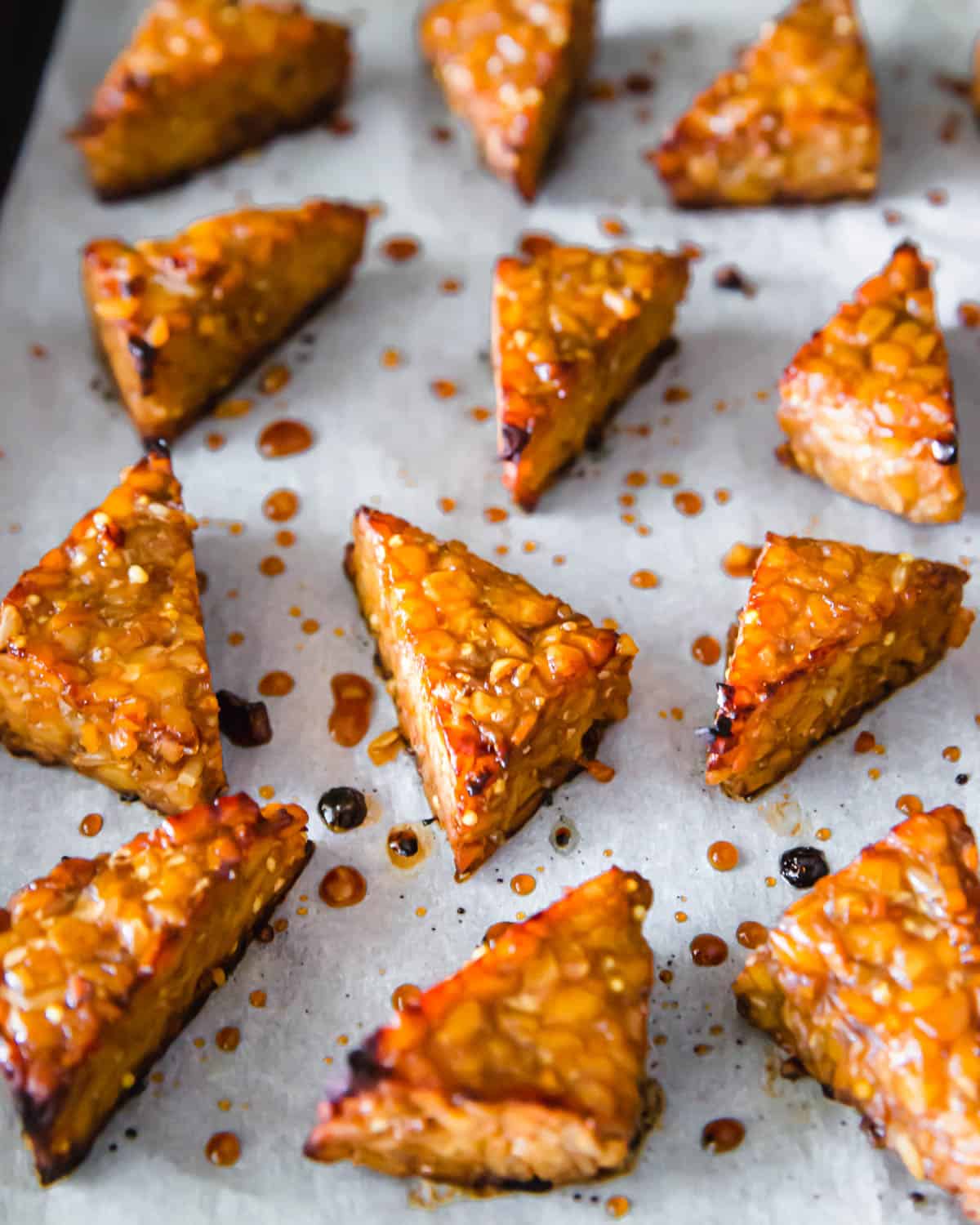 Marinated tempeh is oven baked until crispy golden edges and the perfect vegan based meal.
