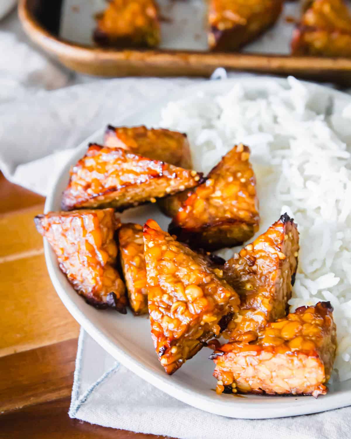 Crispy baked tempeh using a simple marinade for delicious umami flavor.