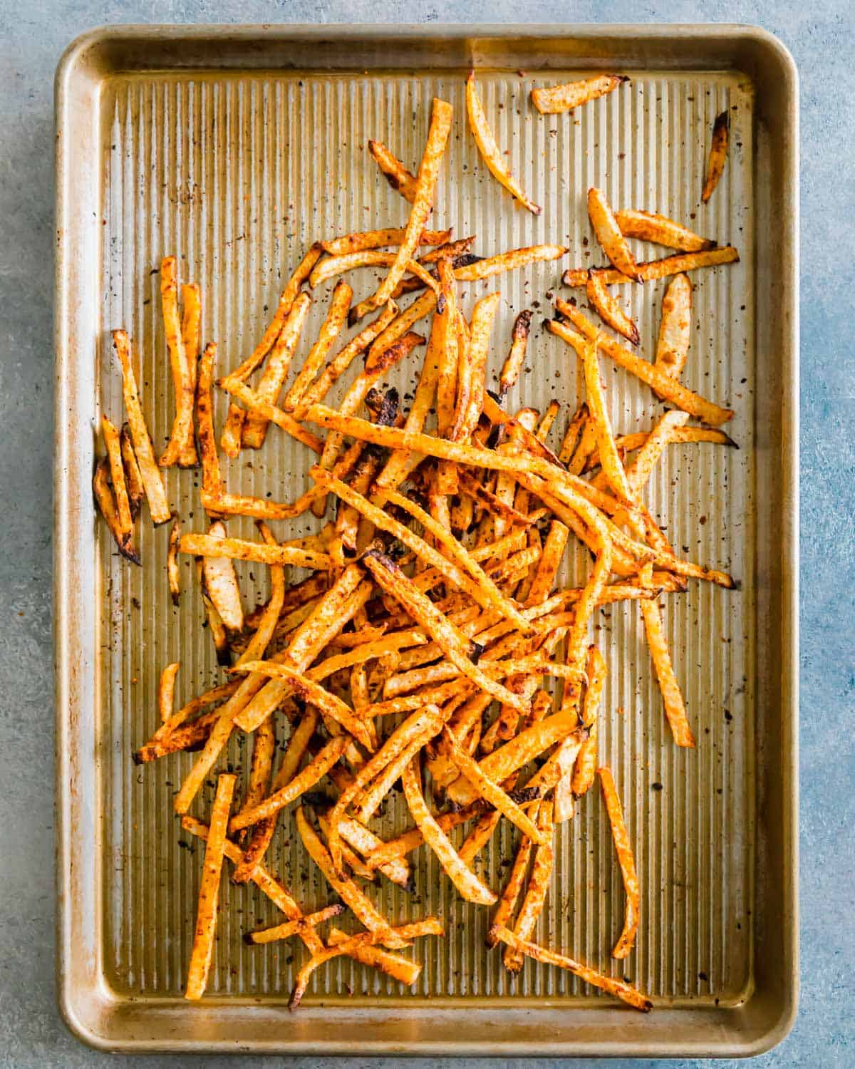 Crispy jicama fry recipe that bakes up easily in the oven in just 25 minutes.