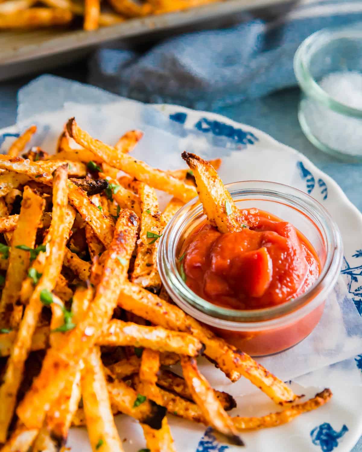 Simply seasoned and baked jicama fries make a great healthier alternative to regular fries when the craving strikes!