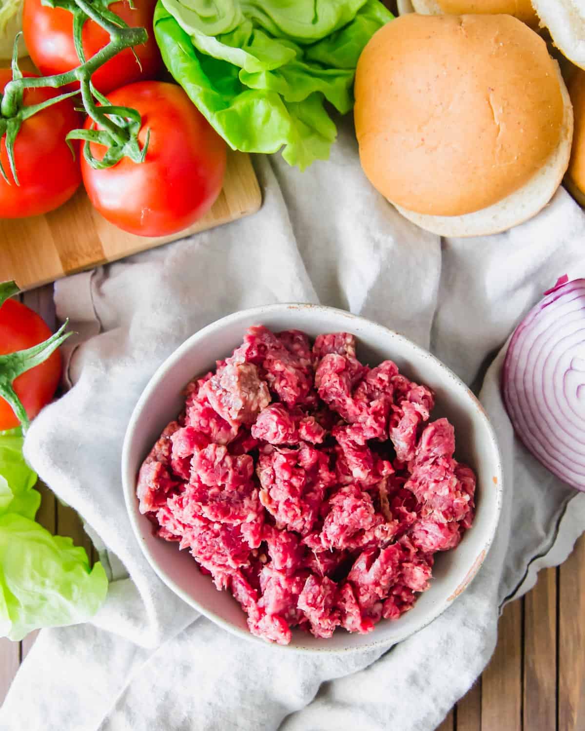 Ground elk meat in a bowl to make elk burgers.