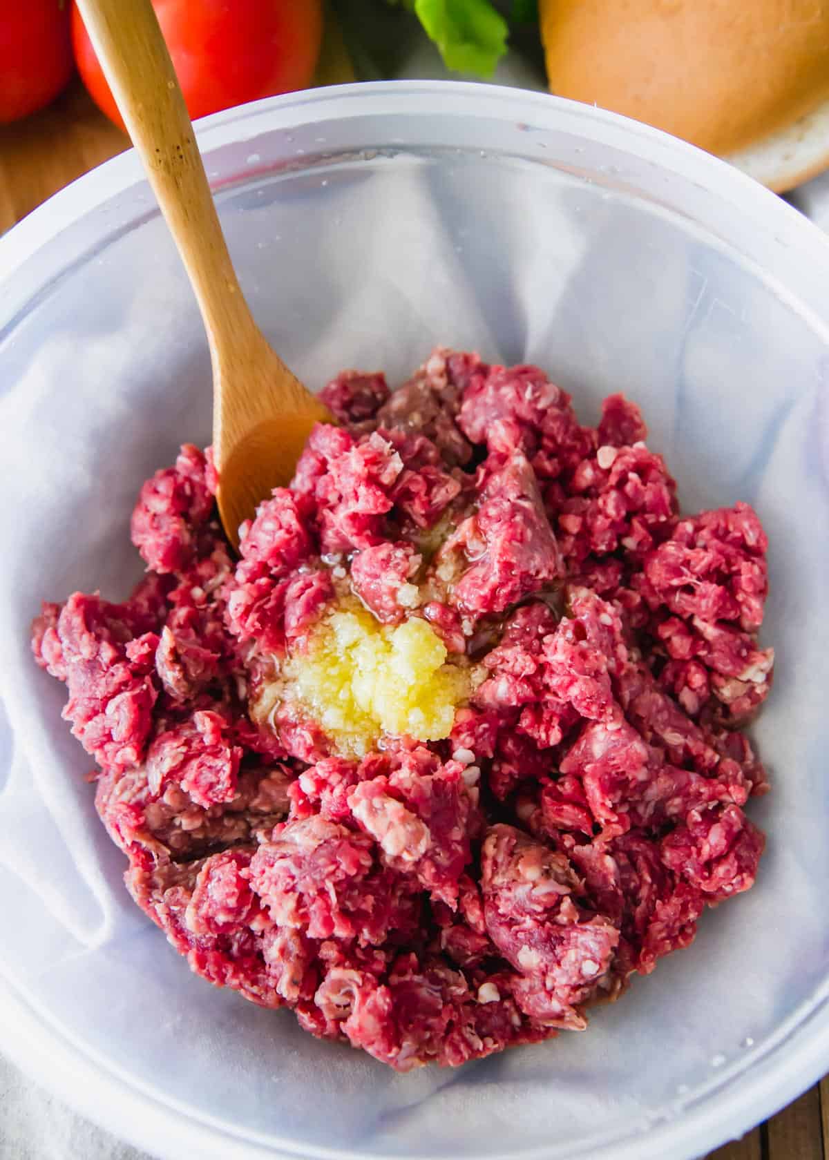 Ground elk meat with ghee to make a juicy grilled elk burger.