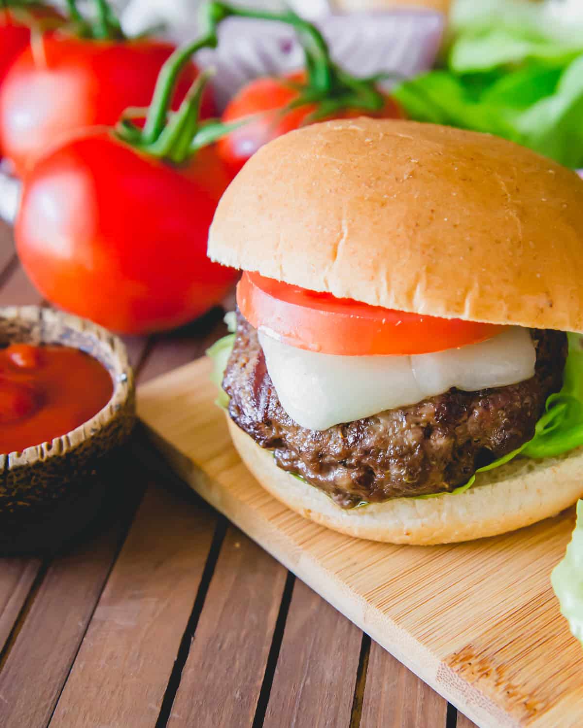 Easy recipe to use up ground wild elk meat in a medium rare juicy elk burger.