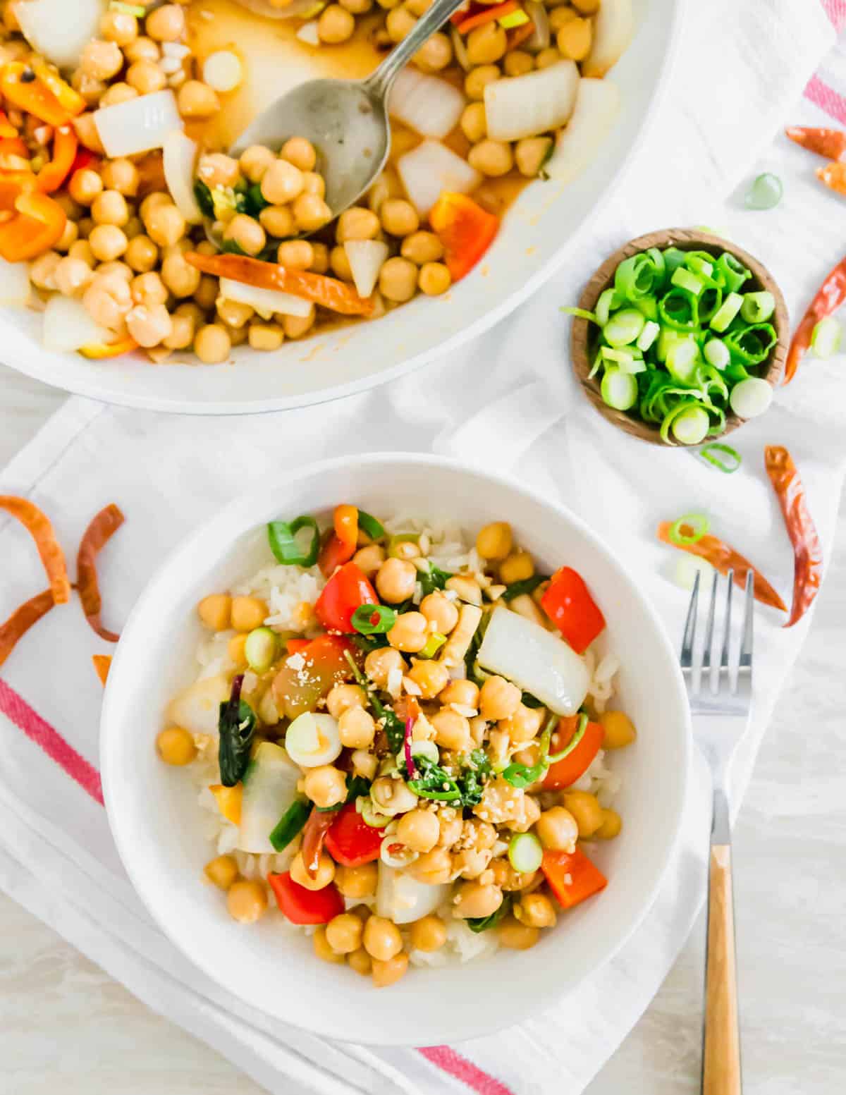 Serve Kung Pao chickpeas over cooked white rice for a vegetarian version of your favorite takeout meal.