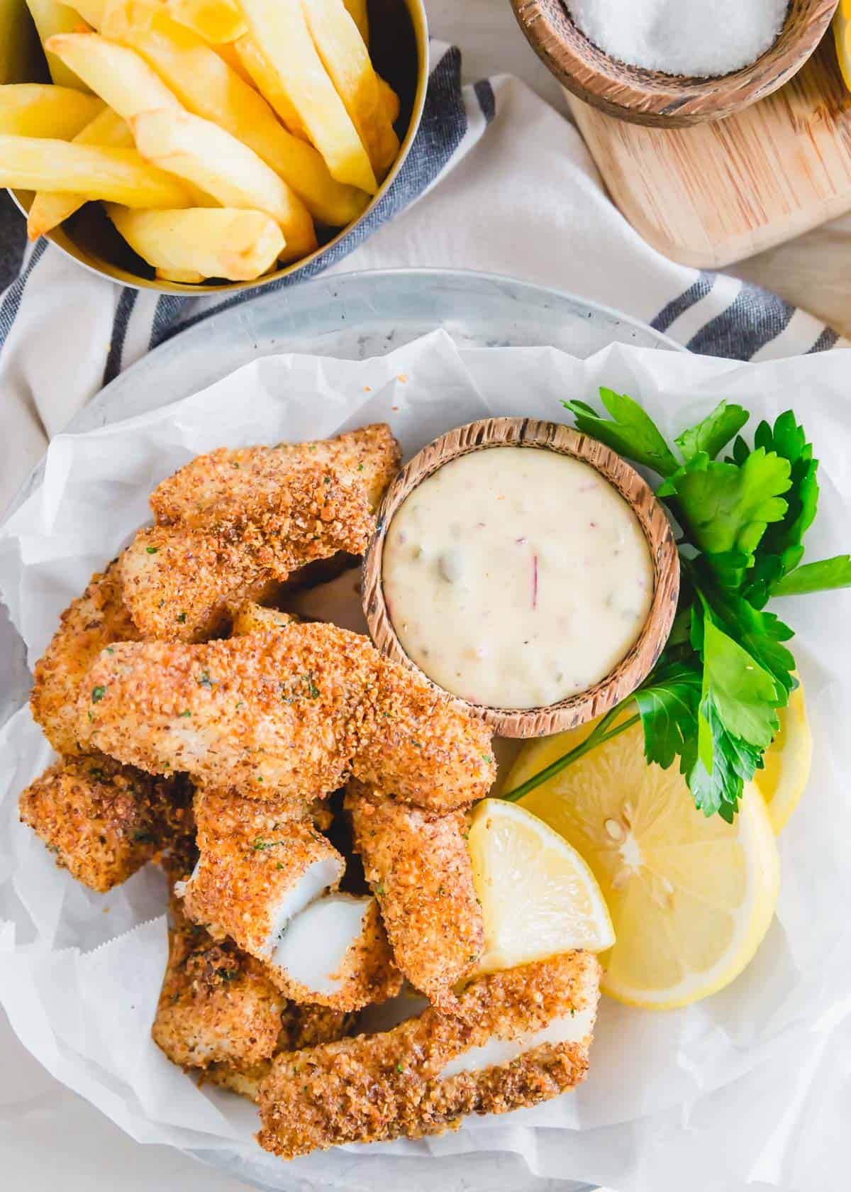 https://www.runningtothekitchen.com/wp-content/uploads/2021/02/air-fryer-fish-sticks-6.jpg