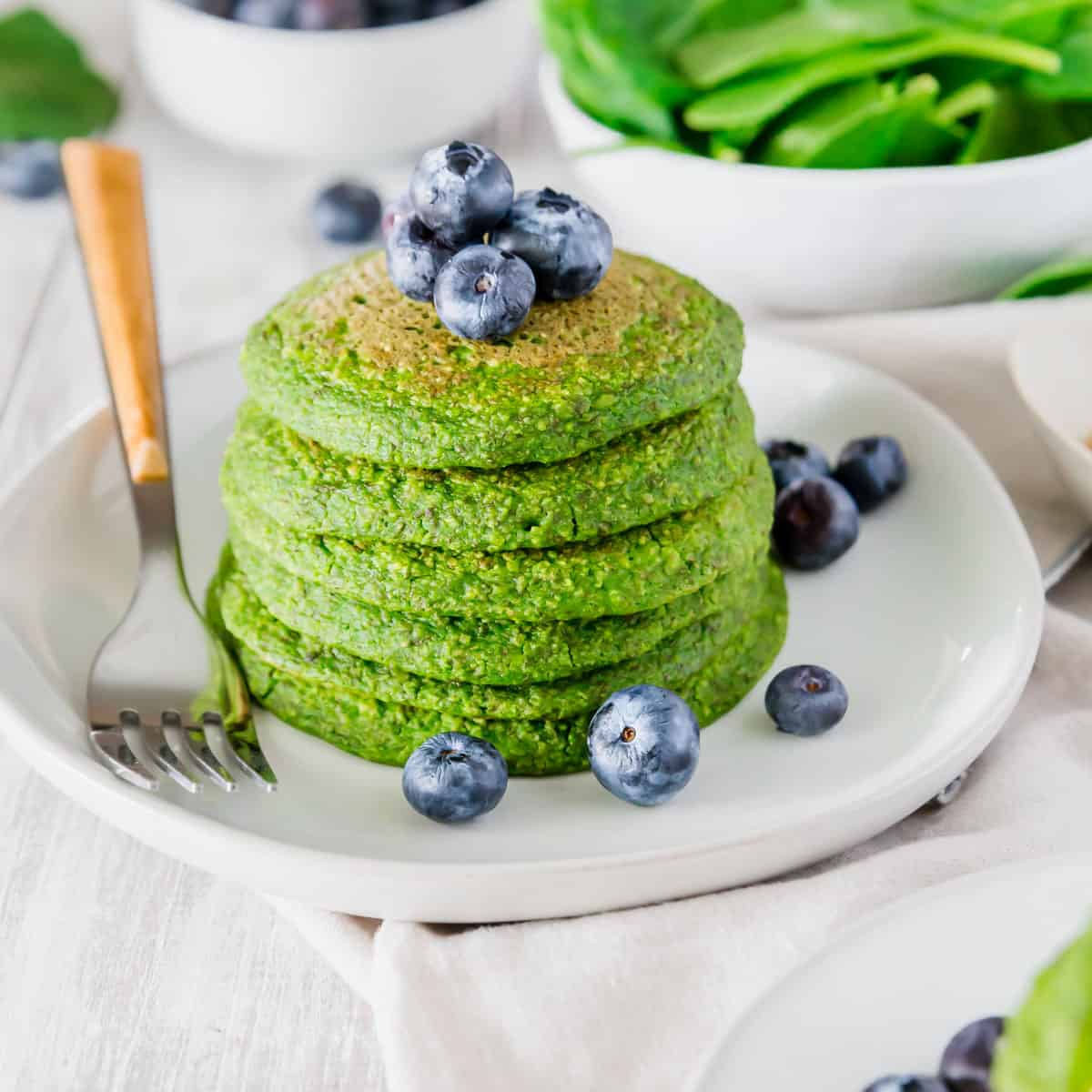 Enjoy a stack of these gluten-free and vegan green spinach pancakes for St. Patrick's Day!