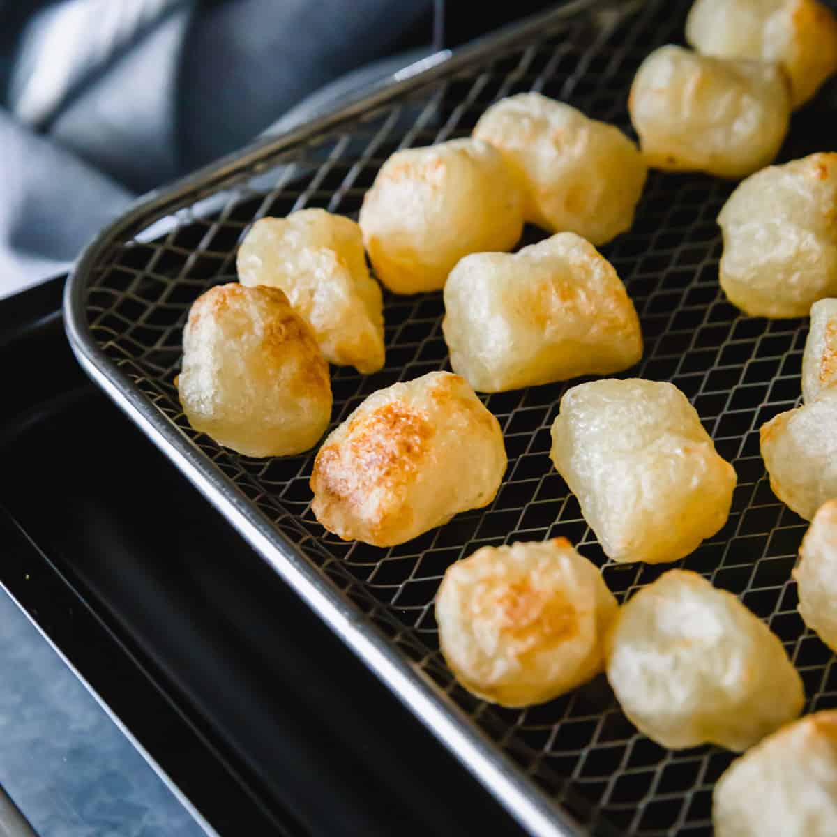 After 16-18 minutes in the air fryer cauliflower gnocchi is golden brown around the edges and perfectly crispy in texture to enjoy however you like.