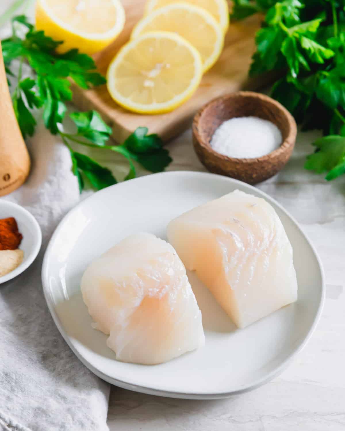 Fresh cod loin for making cod in the air fryer with lemon and spices.