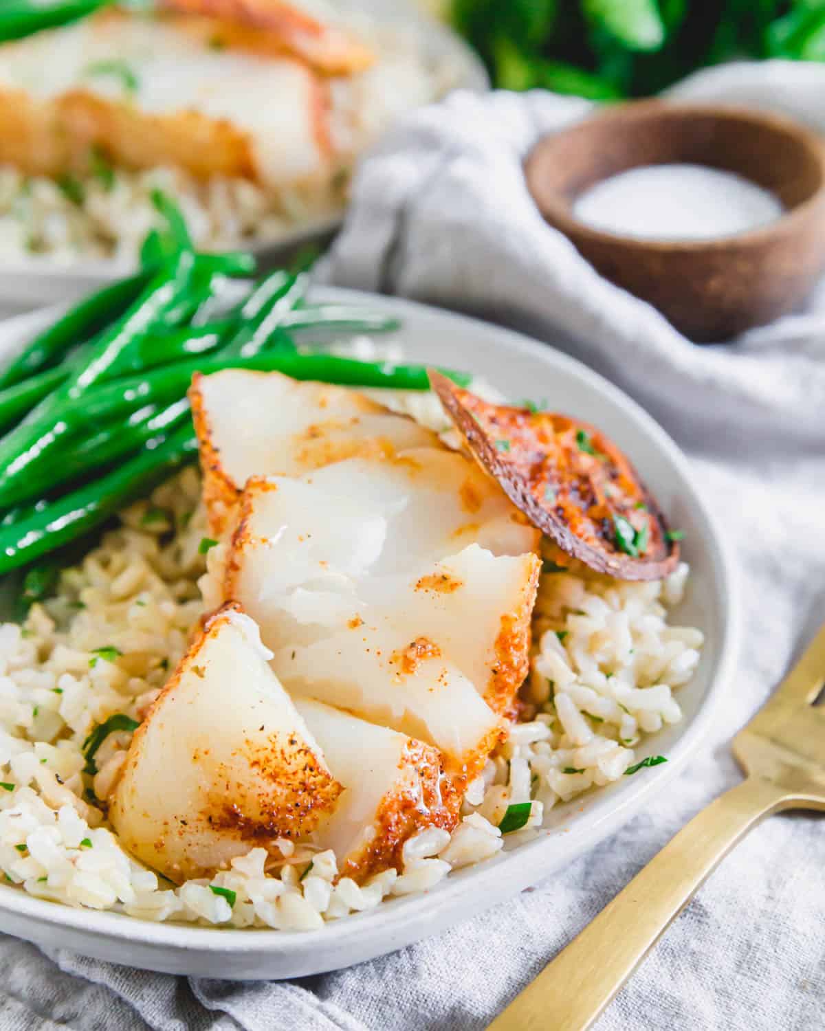 Tender, flaky and delicate cod cooked in the air fryer with just a handful of simple ingredients.