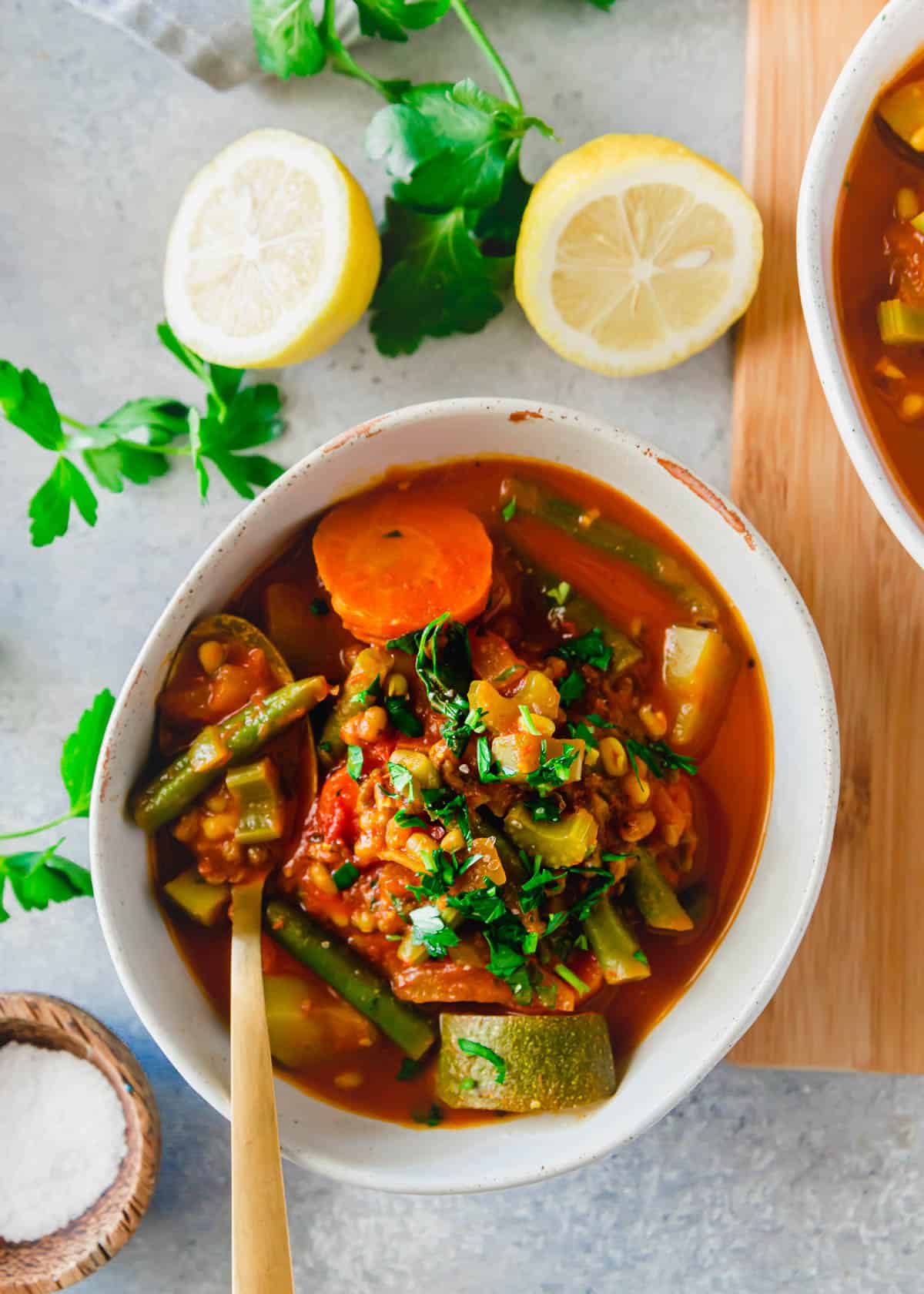 Vegetarian mung bean soup recipe in a bowl with a spoon.