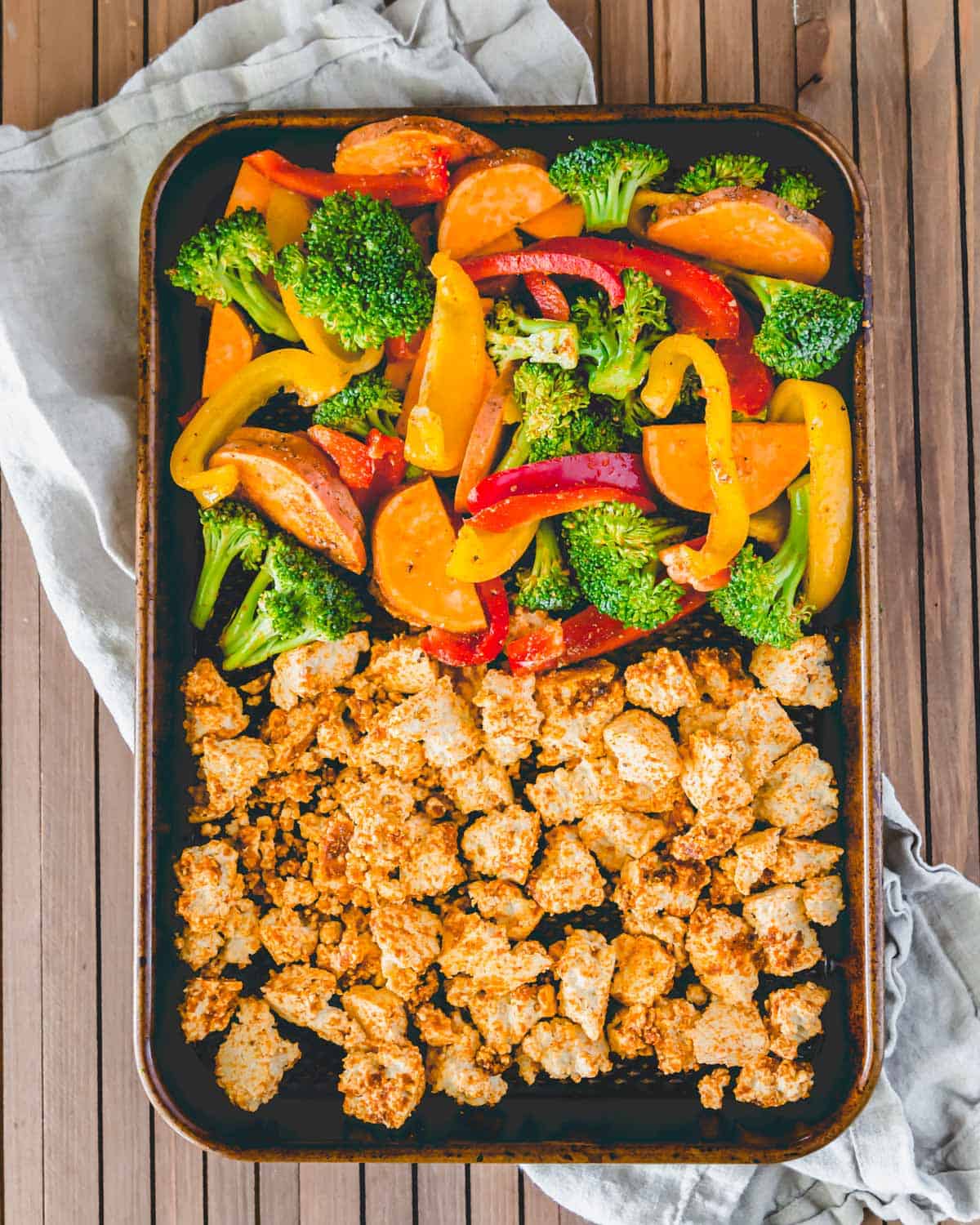 BBQ tofu sheet pan dinner prepped and ready to be baked in the oven.