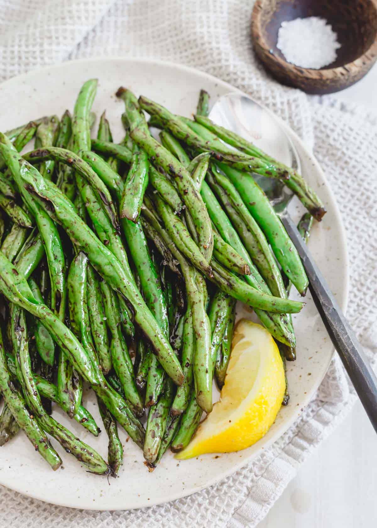 Recipe for how to grill green beans on an outdoor grill.