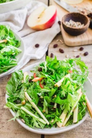 mizuna lettuce salad with apples and raisins