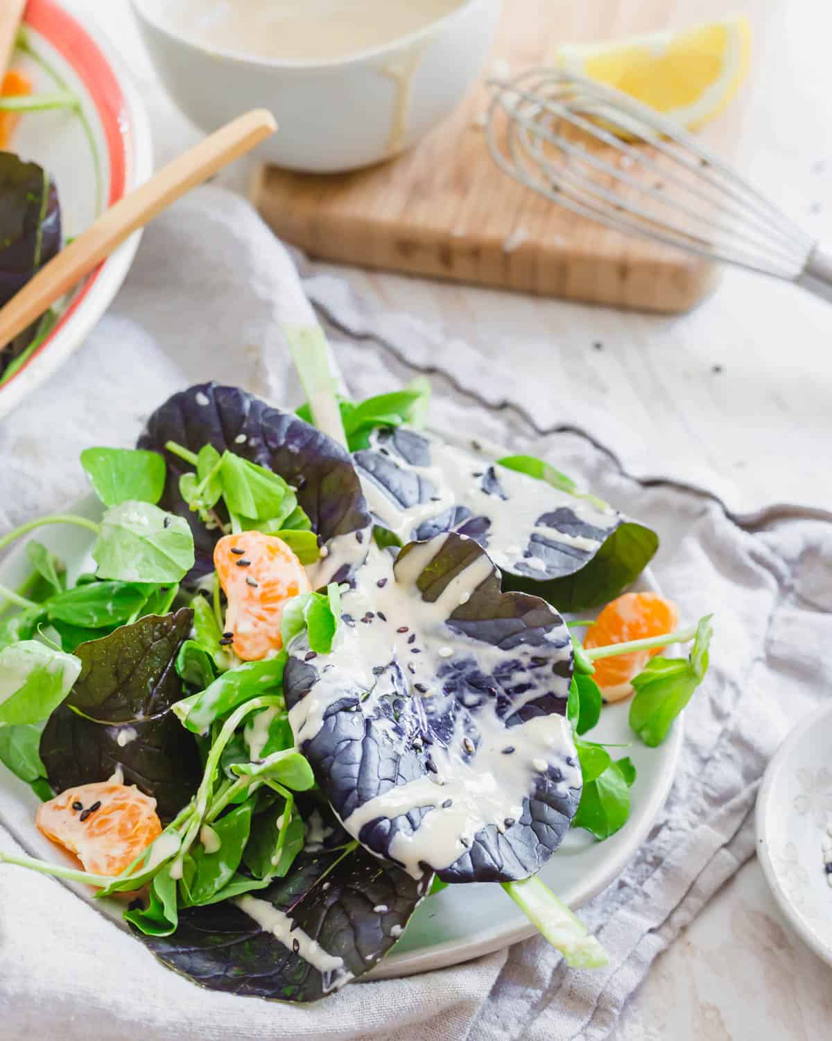 Tatsoi greens tossed with pea shoots, clementines and sesame seeds served with a tahini dressing.