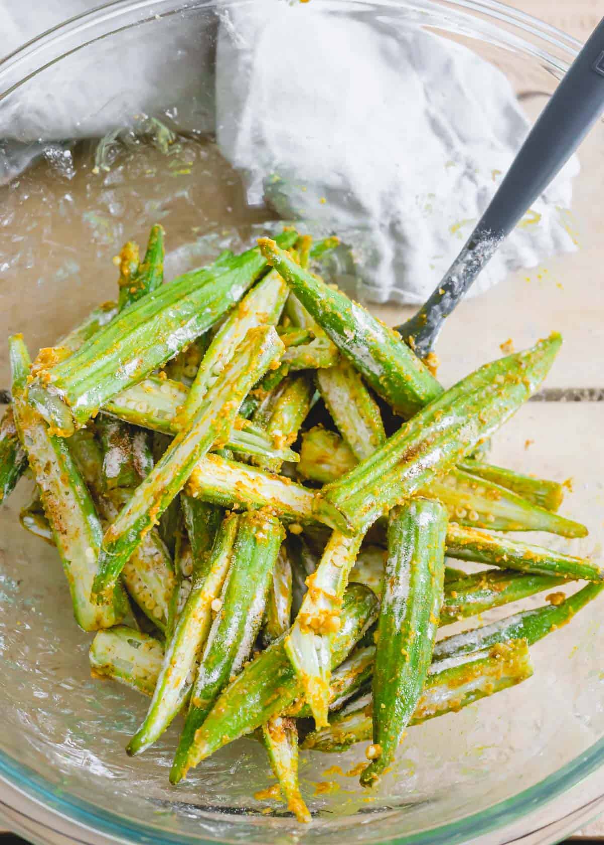 Seasoned okra before air frying.