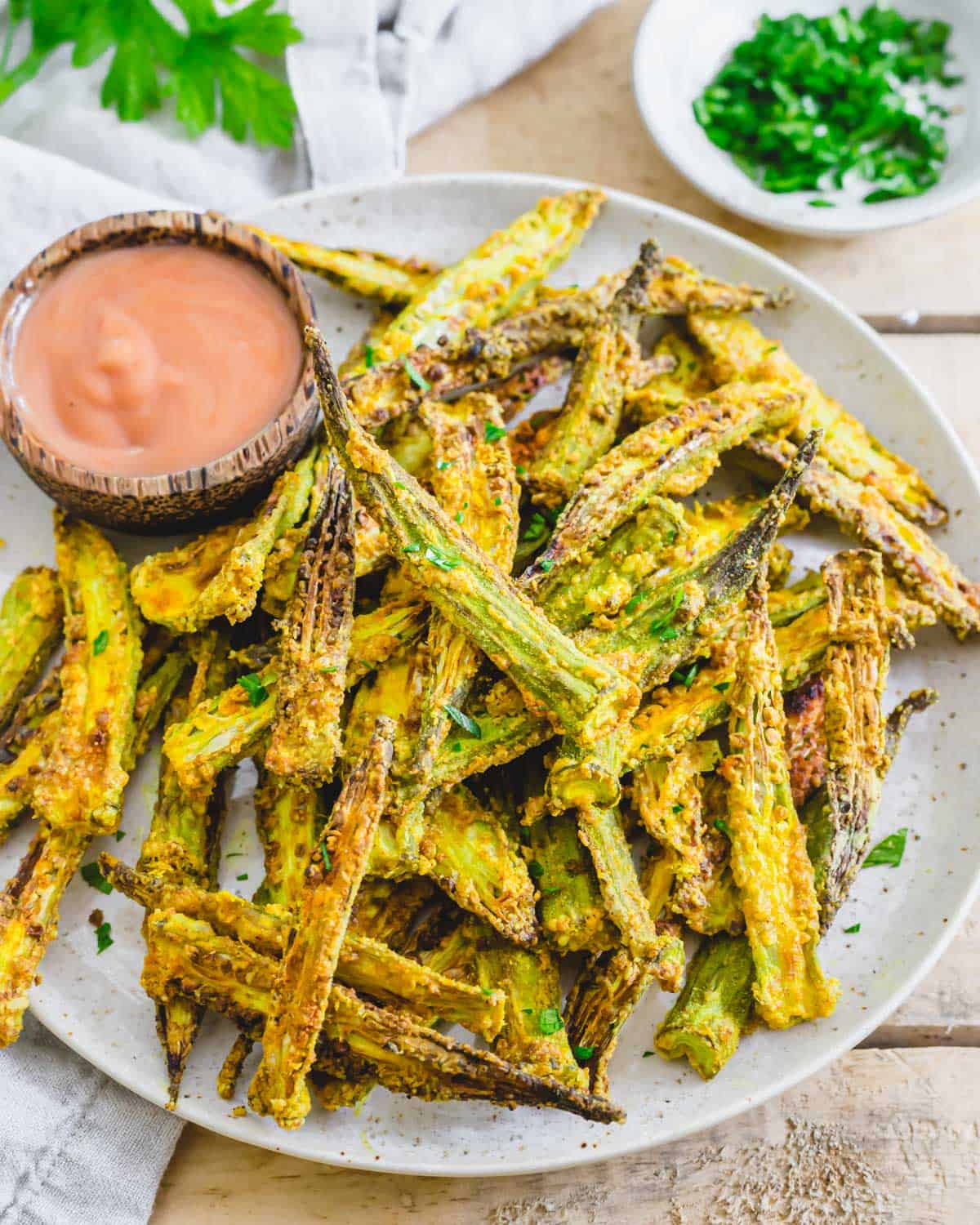 Crispy air fried okra seasoned with garlic powder and cumin.